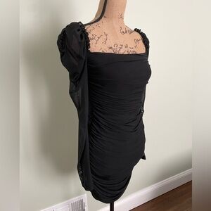Black mini dress with sheer off the shoulder sleeves